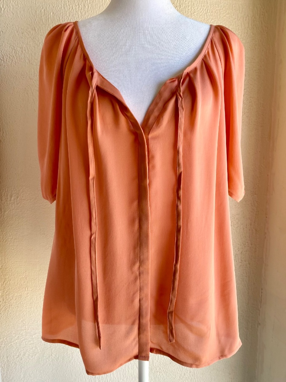 NWT Joie apricot silk short sleeved top with front buttons. Size M